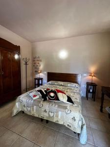 A bed or beds in a room at Agriturismo Corte San Girolamo