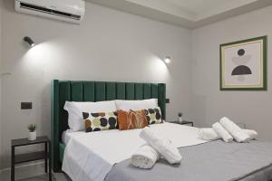 Postel nebo postele na pokoji v ubytování Chianu Palì - Guest Rooms camera Agrigento