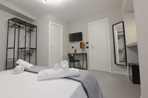 Postel nebo postele na pokoji v ubytování Chianu Palì - Guest Rooms camera Agrigento