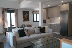 Kuchyňa alebo kuchynka v ubytovaní APARTAMENTOS VIRGEN DEL CARMEN