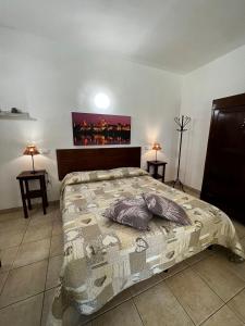A bed or beds in a room at Agriturismo Corte San Girolamo