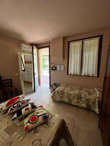 A bed or beds in a room at Agriturismo Corte San Girolamo