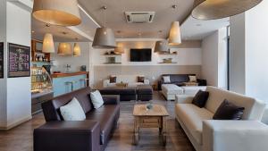 Lounge alebo bar v ubytovaní AX Sunny Coast Resort & Spa
