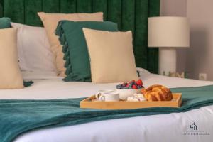 A bed or beds in a room at Living4Malaga Infinity Views Penthouse