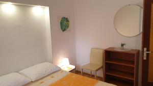 Postel nebo postele na pokoji v ubytování Accomodation Mirjana Rooms