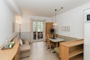 Телевизор и/или развлекательный центр в Residence Hof am Keller