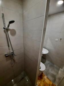 Koupelna v ubytování Rooms Optim