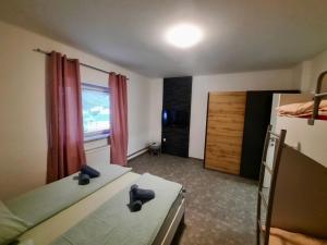 Postel nebo postele na pokoji v ubytování Rooms Optim