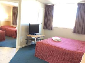 Voodi või voodid majutusasutuse Capital View Motor Inn - Free Parking toas