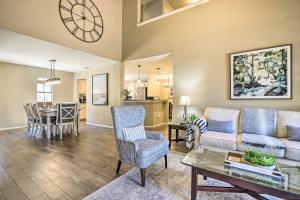 a living room with a couch and a table at Updated Retreat with Game Room and Boat Ramp Access! in Lago Vista