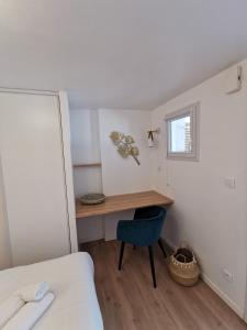 Posteľ alebo postele v izbe v ubytovaní La petite Halte - Les Maisons de Madeleine