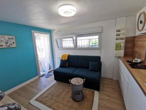 Posedenie v ubytovaní La petite Halte - Les Maisons de Madeleine