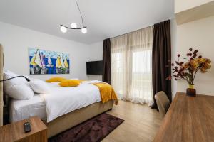 Posteľ alebo postele v izbe v ubytovaní Villa Faloniga + 37 fotografií