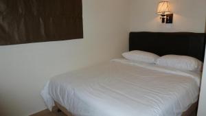 Postel nebo postele na pokoji v ubytování Hotel Hong