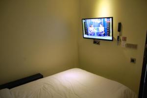 Μια τηλεόραση ή/και κέντρο ψυχαγωγίας στο Aubon Hostel +71 φωτογραφίες