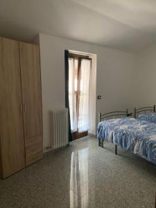 Voodi või voodid majutusasutuse Casa vacanze nonna Orsola toas