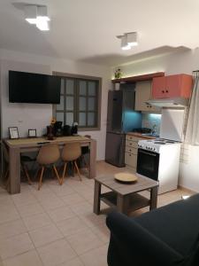 Kuchyň nebo kuchyňský kout v ubytování petite nafplio sofos apartment