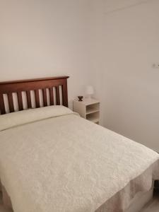 Łóżko lub łóżka w pokoju w obiekcie Hormaza Chiclana
