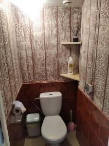 Um banheiro em Apartamentai KINTAI