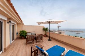 Balkon lub taras w obiekcie Suites At Sea II