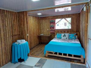 Llit o llits en una habitació de El Encanto Nature Reserve