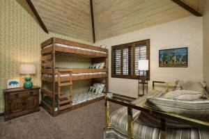 a bedroom with two bunk beds and a desk at Cascade Village 50 Near Purgatory - Marmot Meadows Retreat in Durango Mountain Resort +57 photos