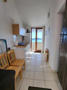 Kuchyňa alebo kuchynka v ubytovaní Studio Apartment Portal