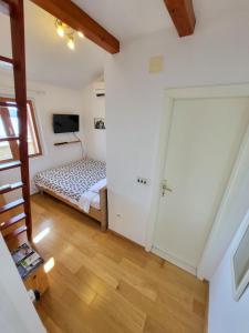 Posteľ alebo postele v izbe v ubytovaní Studio Apartment Portal