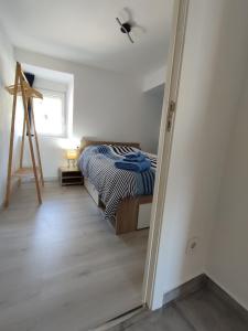 Postel nebo postele na pokoji v ubytování Casa Máxica de Oia