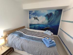 Postel nebo postele na pokoji v ubytování Casa Máxica de Oia