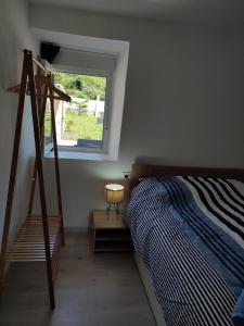 Postel nebo postele na pokoji v ubytování Casa Máxica de Oia
