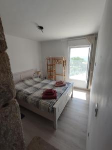 Postel nebo postele na pokoji v ubytování Casa Máxica de Oia