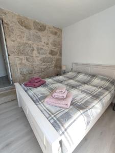 Postel nebo postele na pokoji v ubytování Casa Máxica de Oia