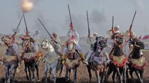a group of people riding horses in a field at Studio Dar ziane in El Jadida