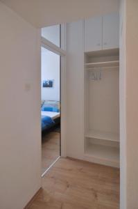 Postel nebo postele na pokoji v ubytování Apartment Nemo