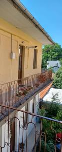 a balcony of a house with chairs on it at M20 Studios in Cluj-Napoca