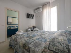 Posteľ alebo postele v izbe v ubytovaní Camere Casa Azzurra + 17 fotografií