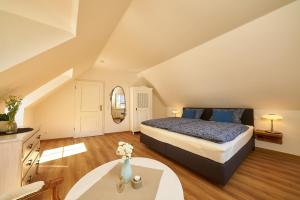 Een bed of bedden in een kamer bij Villa Moselle