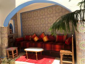 Χώρος καθιστικού στο Hotel Nisrine