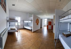 Posteľ alebo postele v izbe v ubytovaní Albergue Espiritu Xacobeo