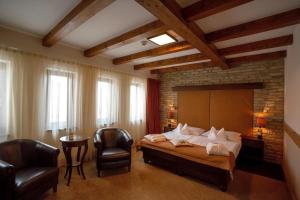 Postel nebo postele na pokoji v ubytování Crocus Gere Bor Hotel Resort & Wine Spa
