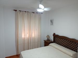 Ένα ή περισσότερα κρεβάτια σε δωμάτιο στο Balcón de El Bosque