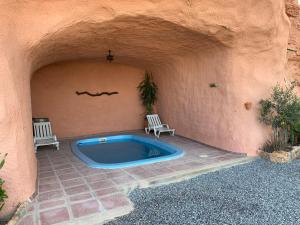 The swimming pool at or close to Cuevas el Torriblanco