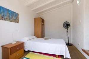 A bed or beds in a room at Holiday Home - Son Vida