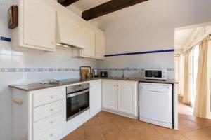A kitchen or kitchenette at Holiday Home - Son Vida