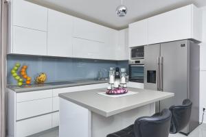 Kjøkken eller kjøkkenkrok på Apartments Infinity