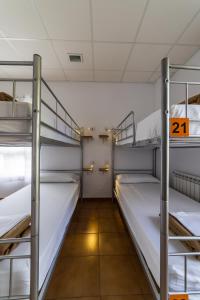 Posteľ alebo postele v izbe v ubytovaní Albergue Espiritu Xacobeo
