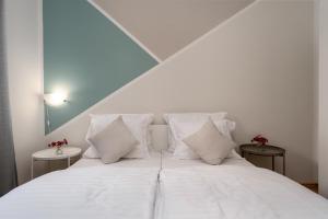 Posteľ alebo postele v izbe v ubytovaní Apartment Fiorella