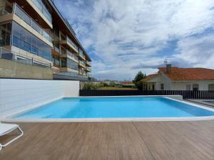 Πισίνα στο ή κοντά στο Precioso apartamento con piscina