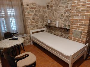 Posteľ alebo postele v izbe v ubytovaní Guesthouse Merla
